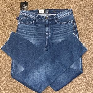 Brand new with tags, mis-rise skinny jeans with frayed hem